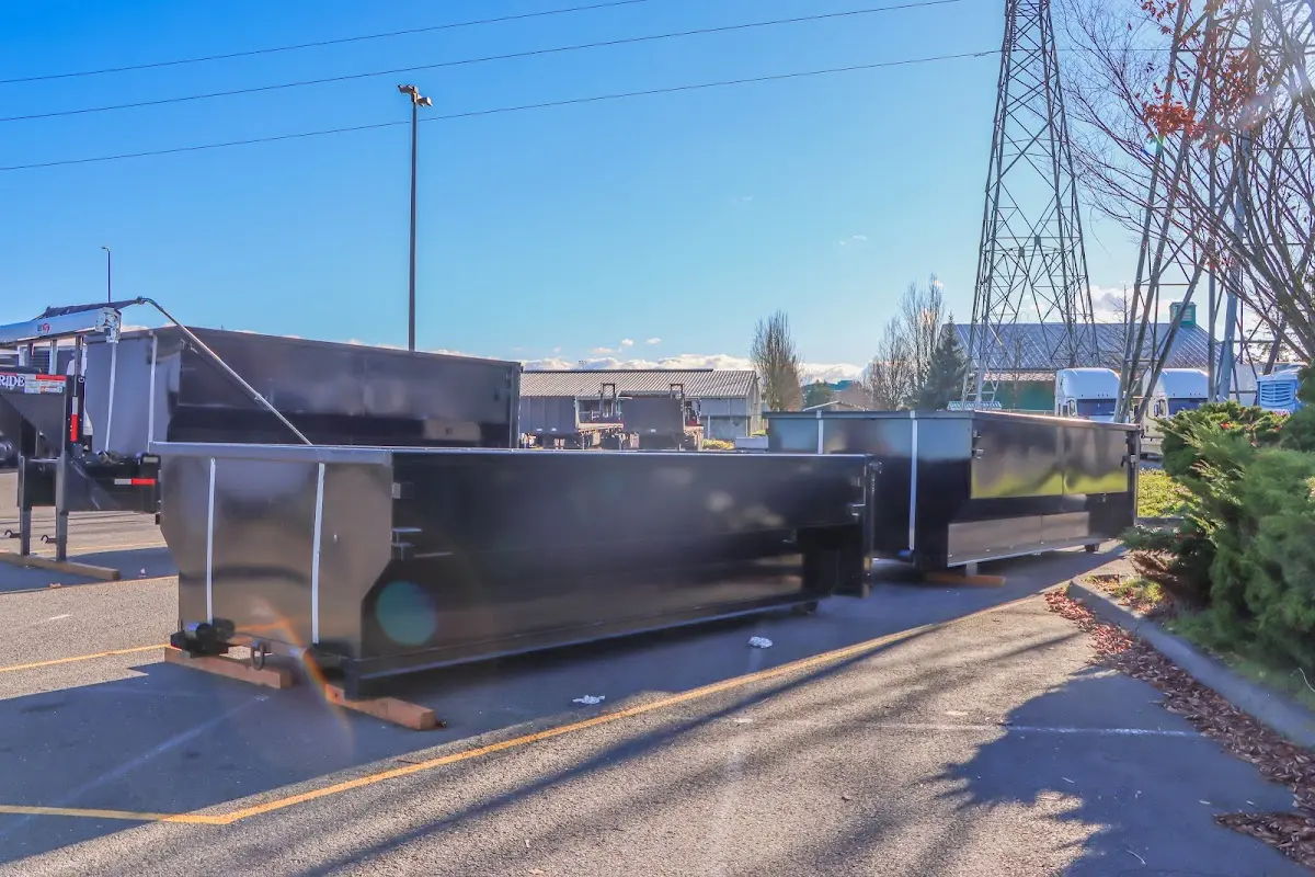 Roll-off dumpster ready for waste disposal at job site for Demolition Dumpster Rental in Tuscaloosa